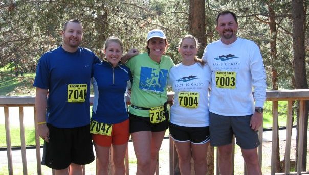 Stephanie Morfitt and her siblings. They all have race numbers on. Steph is second from the left. Her sister, Sissi is in the center.